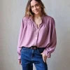 Blusa con botones rosa