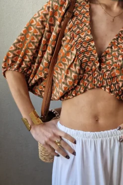 Blusa corta goma naranja y verde
