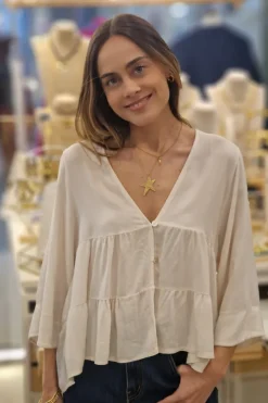Blusa cuello pico con cortes beige