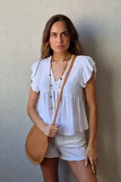 Blusa cuello pico con detalles lurex blanca