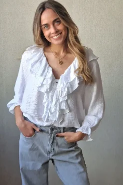 Blusa cuello pico con volantes blanco