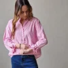 Blusa rayas con botones fucsia