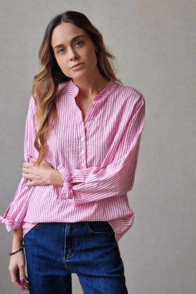 Blusa rayas con botones fucsia