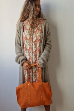 Bolso de ante shopping con tachuelas naranja