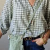 Bolso mini de ante y flecos verde