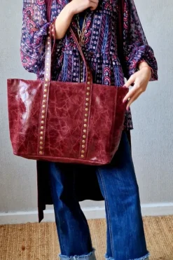Bolso shopper tachuelas granate