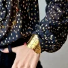 Brazalete de acero ondas