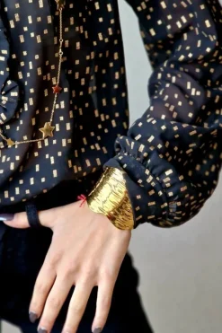 Brazalete de acero ondas