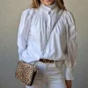 Camisa cuello alto volante blanco