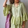 Camisa pistacho de lino con volante calado