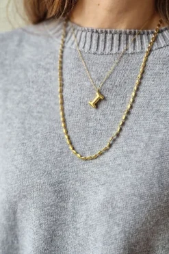 Collar acero dorado