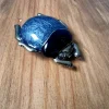 Hebilla lacada escarabajo gris