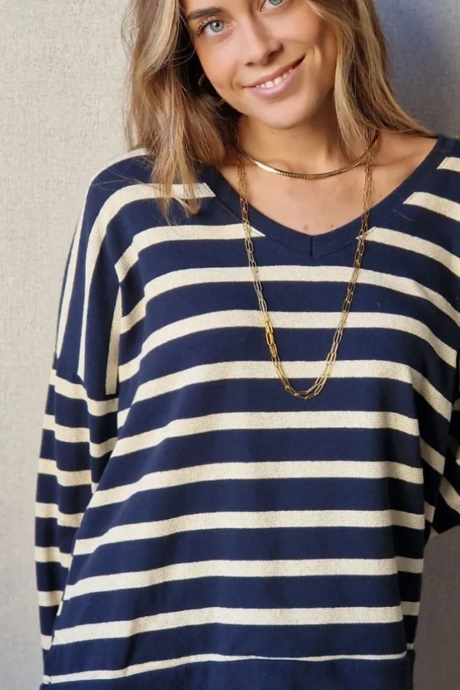 Jersey brillos cuello pico azul marino