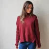 Jersey cuello cisne con dibujo trenzas laterales granate
