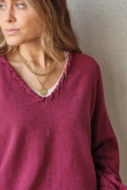 Jersey cuello pico con pespunte magenta