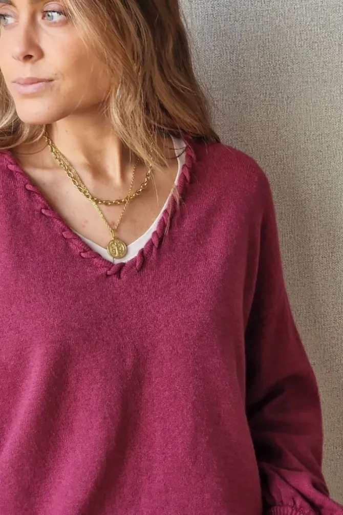 Jersey cuello pico con pespunte magenta