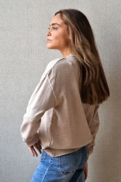Jersey de mujer con codera de estrellas beige