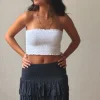 Minifalda pantalón gris con lurex cintura de goma y volantes