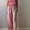 Pantalón estampado peces rosa