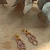 Pendientes de acero con detalles en color rosa palo