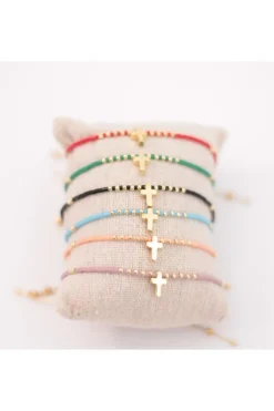 Pulsera ajustable de acero variada con cruz