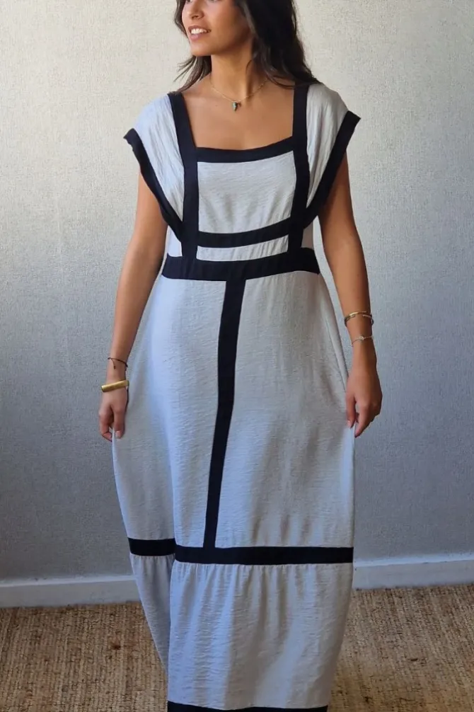 Vestido largo bicolor con volante en gris perla y negro