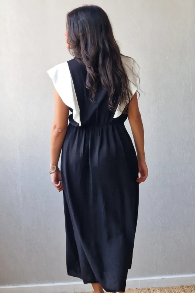 Vestido largo bicolor con volante grande en negro y blanco