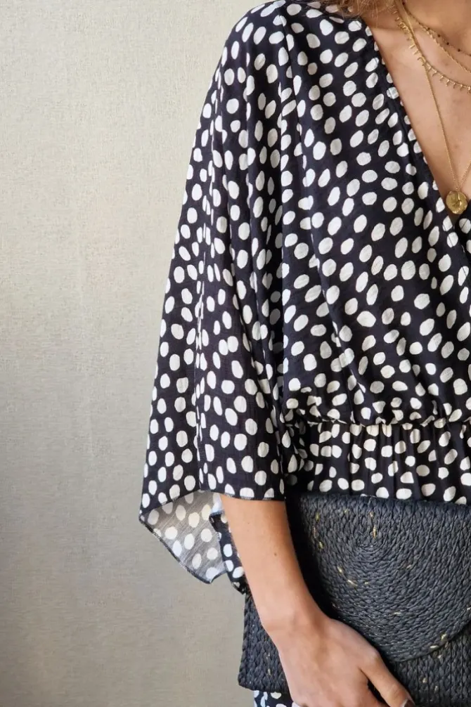 Vestido negro con lunares blancos